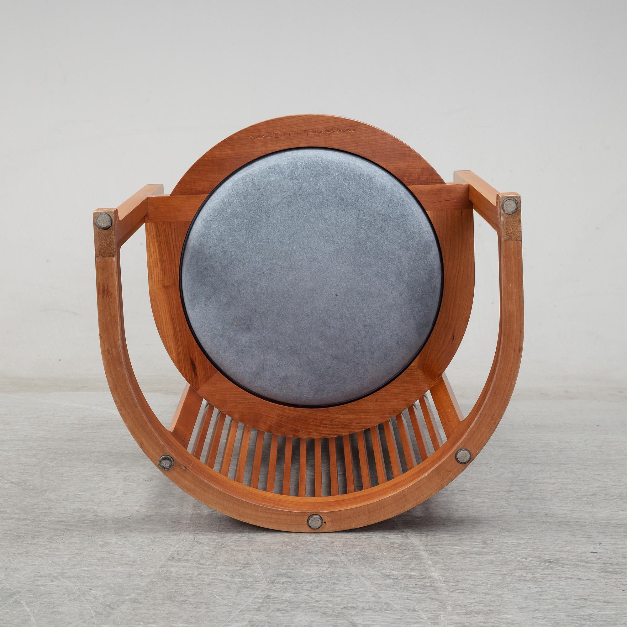 A model 606 'Barrel' chair by Frank Lloyd Wright for Cassina, designed 1937.