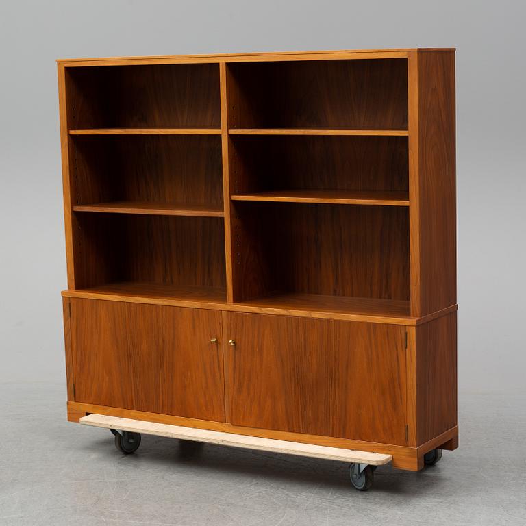 CARL MALMSTEN, a mahogany bookshelf.
