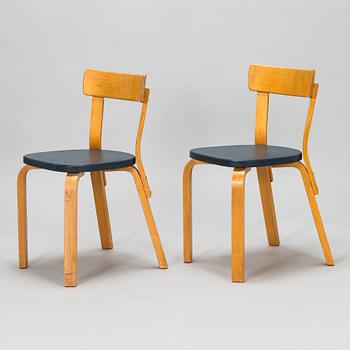 Alvar Aalto, A pair of early 1960s model 69 chairs for O.Y. Huonekalu- ja Rakennustyötehdas A.B.