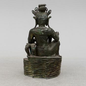 A mid 20th century metal Guan Yin figurine, China.