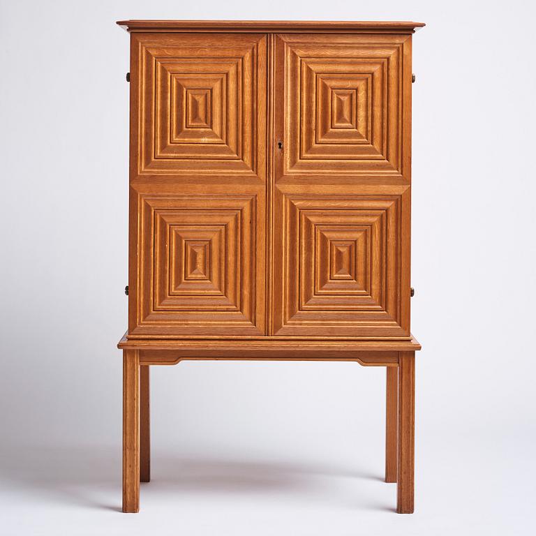 Oscar Nilsson, attributed to, a Swedish Modern oak cabinet, 1940s.