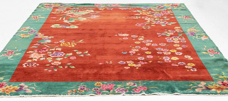 A semi-antique chinese carpet, ca 338 x 266 cm.