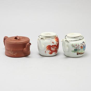 Three Chinese tea pots with covers, 20th Century.