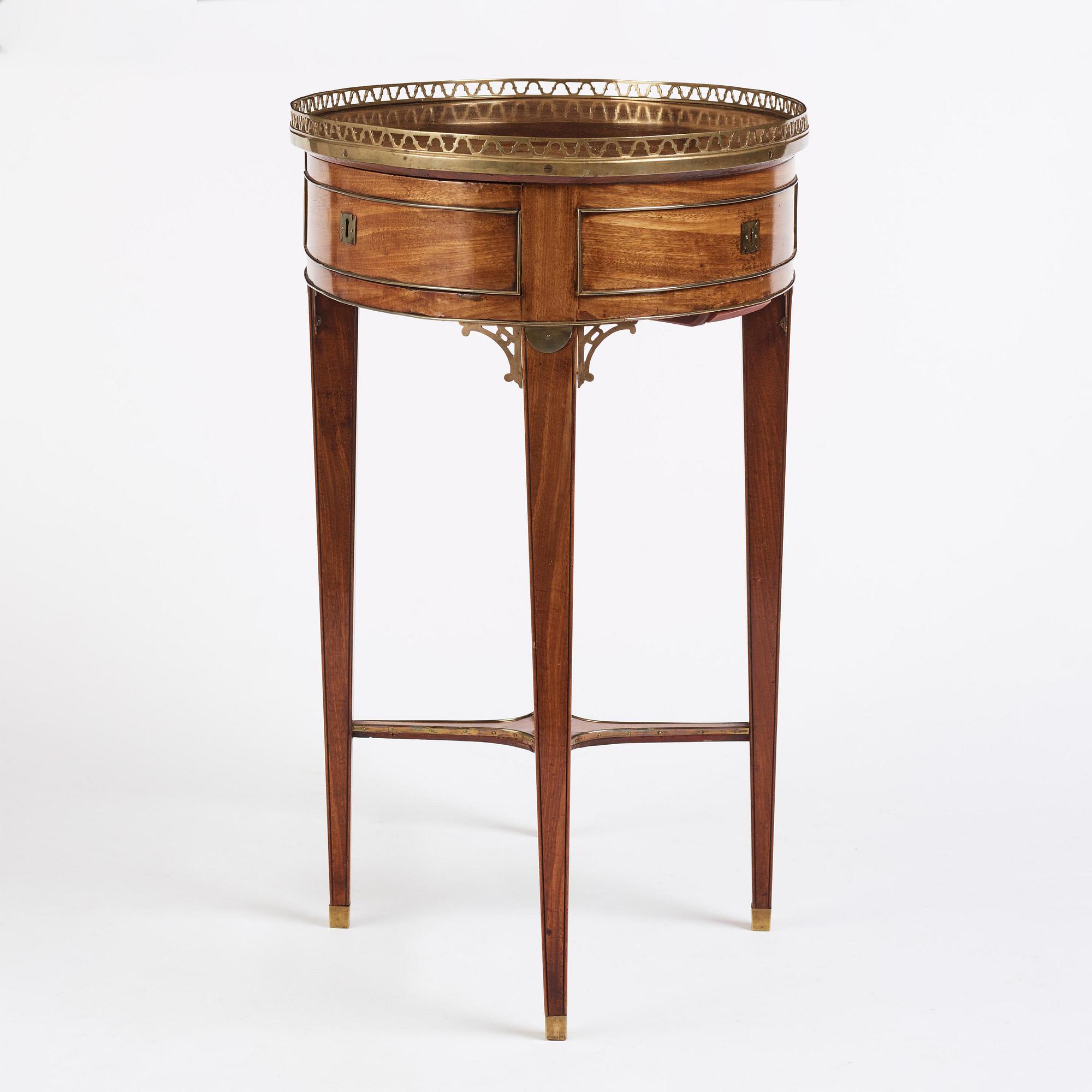 A late Gustavian mahogany  and gilt-brass table in the manner of C. D. Fick, Stockholm late 18th century.
