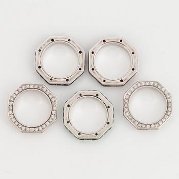 Five Paul Binder rings in 18K white gold set with baguette- and round brilliant-cut diamonds.