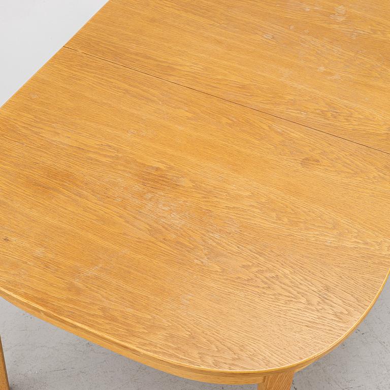 Carl Malmsten, Dining table with 6 chairs, “Ambassadör”, second half of the 20th century.