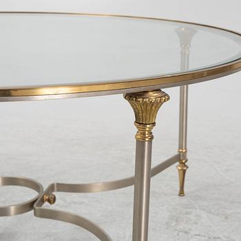 A steel and glass coffee table, Nordiska Kompaniet, end of the 20th Century.