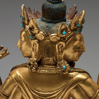 A Sino-Tibetan gilt copper alloy figure of Ushnisha Vinaya, late 18th century/circa 1800.
