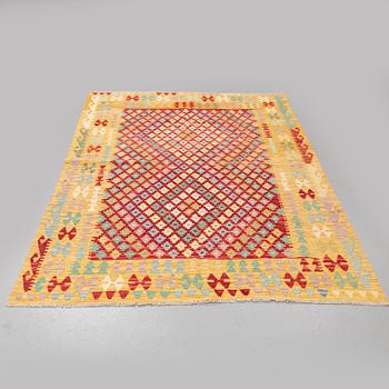 A rug, kilim 245 x 185 cm.