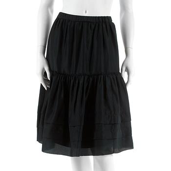 659. DKNY, a black silk frill skirt. Size M.