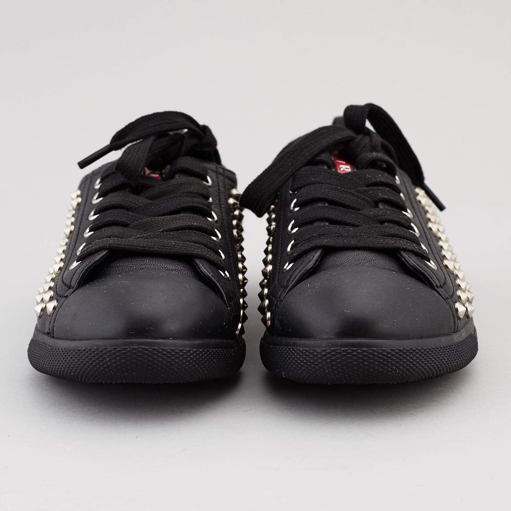 PRADA, two pairs of leather sneakers, size 35,5.
