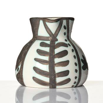 Pablo Picasso, a "Pichet petites têtes" (A.R. 222) faience pitcher, Madoura, Vallauris, France, post 1953.