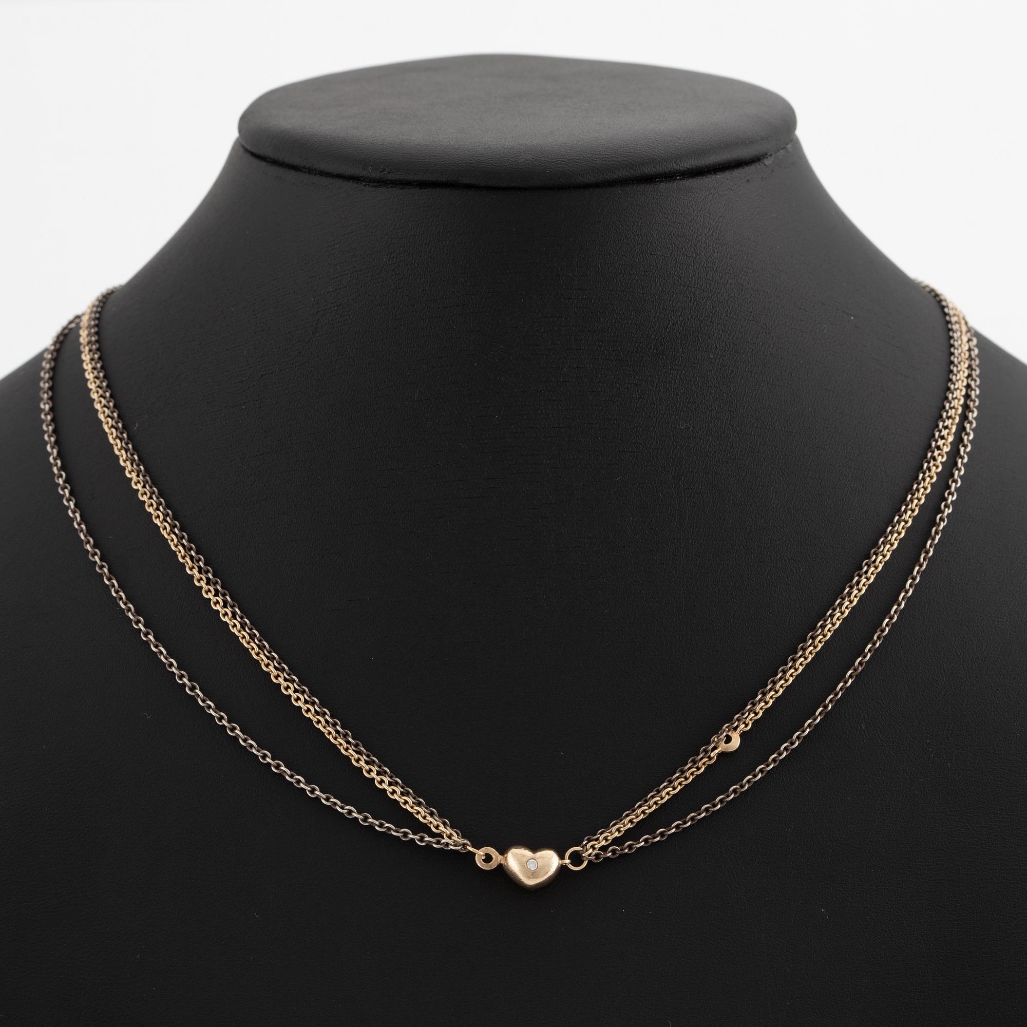 Ole Lynggaard, collier, 14K guld, hjärtformat lås med briljantslipade diamanter.