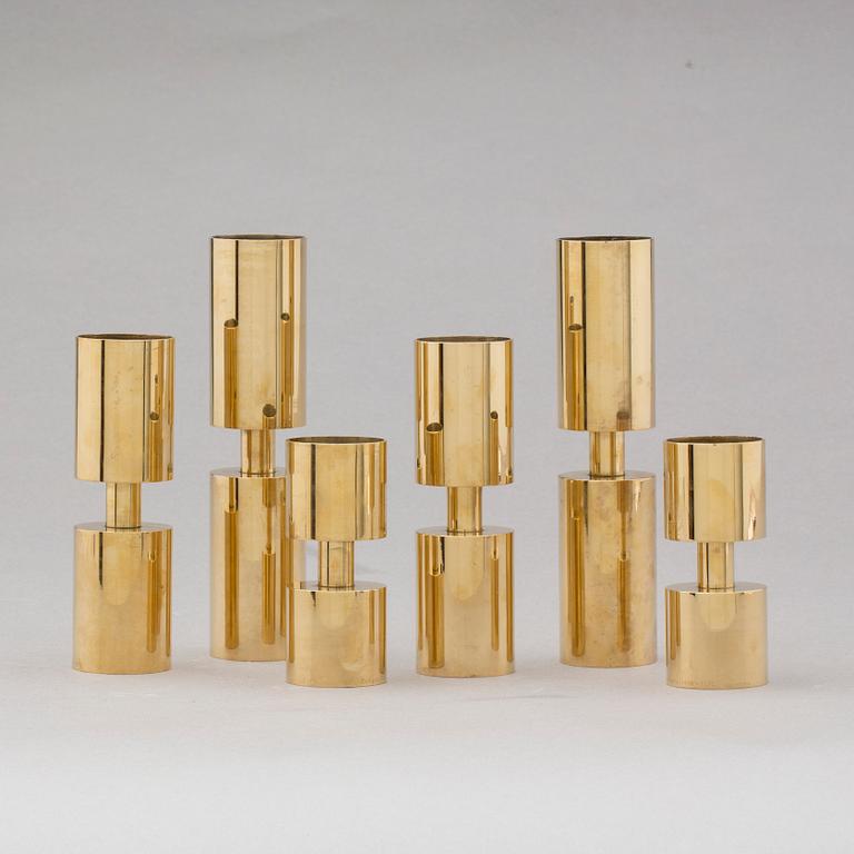 VÄRMESLJUSHÅLLARE, 3 par, mässing, för Zoégas 90-årsjubileum, 1976.