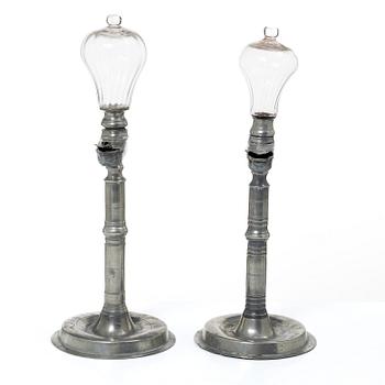 Oillamps, two similar, 19th century.