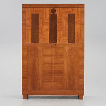 Carl Malmsten, a veneered cabinet, executed by Hjalmar Jackson, Stockholm 1935.