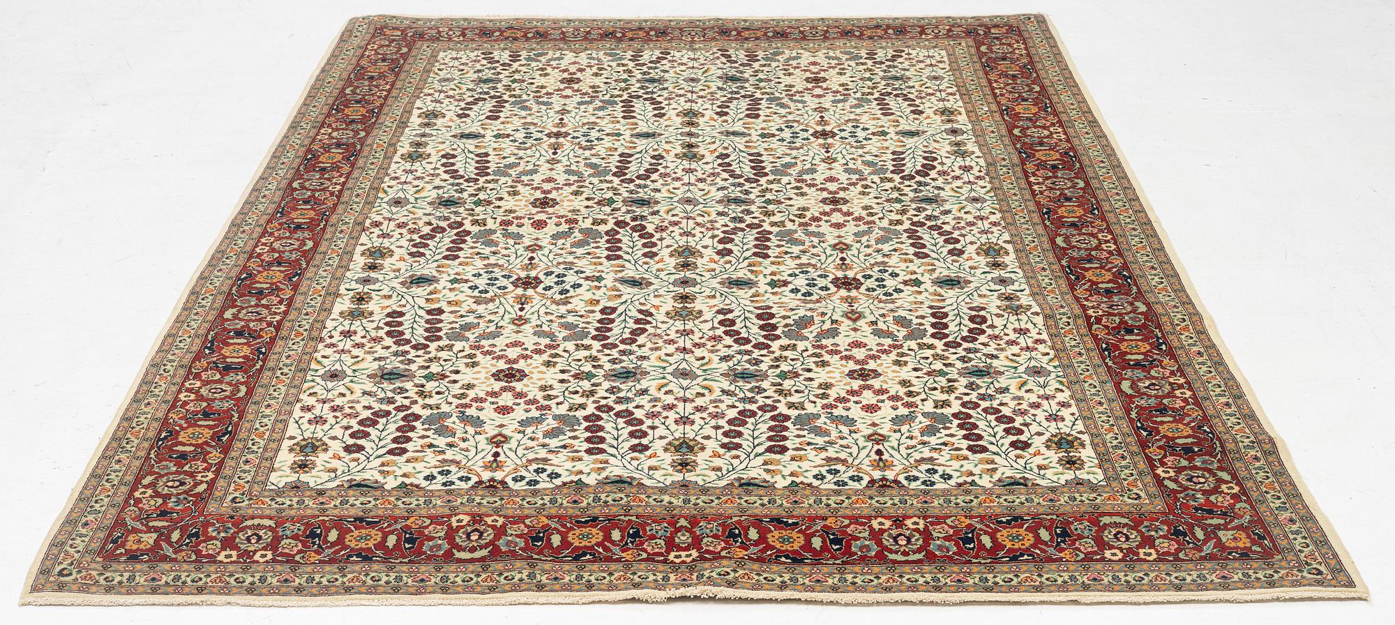 A Hereke carpet, Turkey, c. 303 x 200cm.