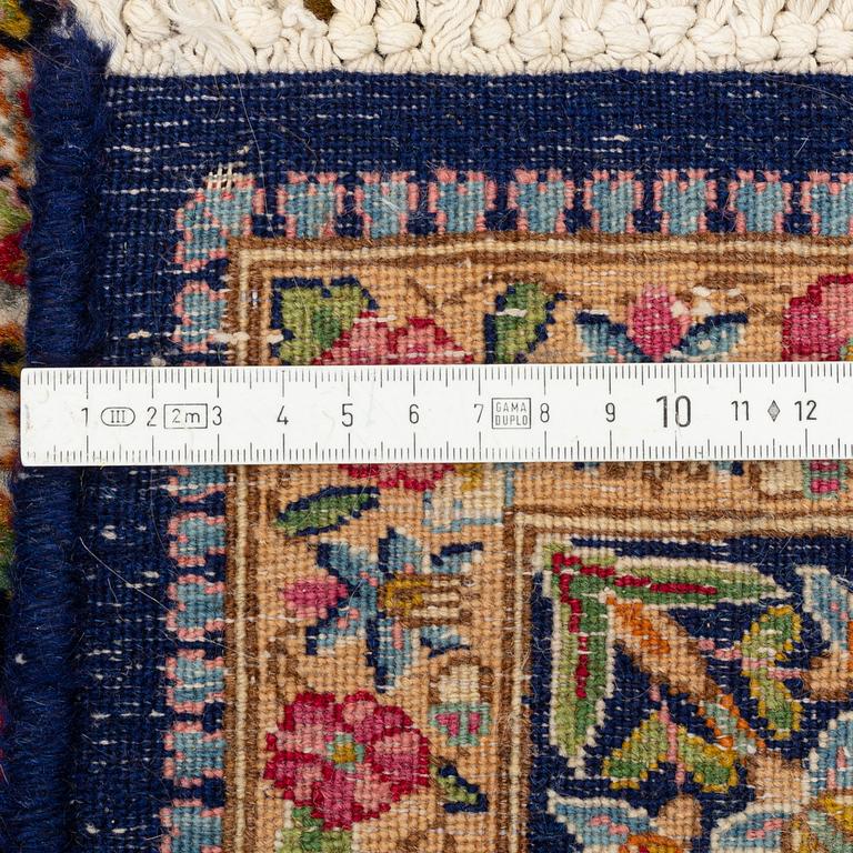A carpet, old Kerman, ca 279 x 176 cm.