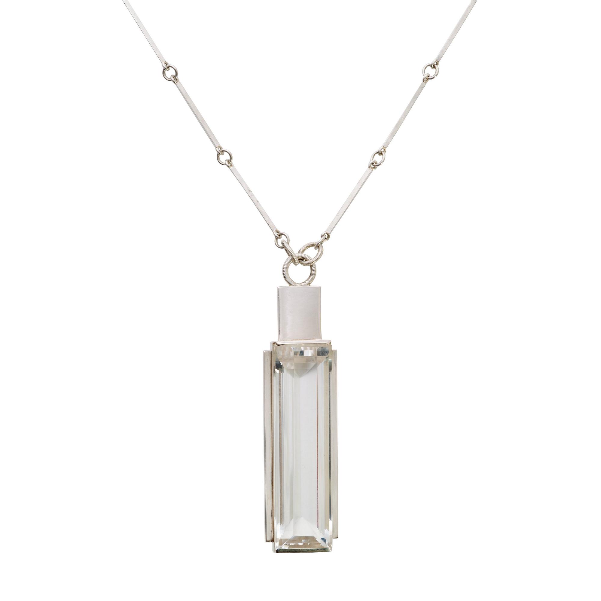 A Wiwen Nilsson sterling facet cut rock crystal pendant and chain, Lund 1933.