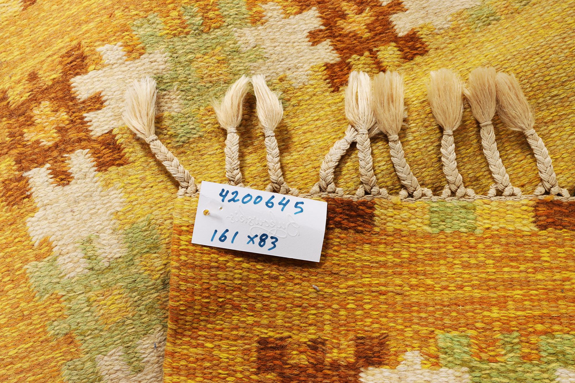 Ingegerd Silow, a flat weave carpet, signed IS, c. 161 x 83 cm.