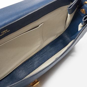 Chloé, a blue leather bag.