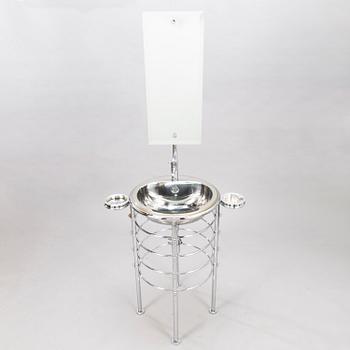 LOLA HERZBURG, A free standing wash unit provided with soapholders and mirror from the 21th century. Rapsel. Italy.