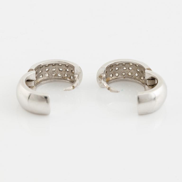 A pair of 18K white gold earrings with diamonds ca. 0.60 ct in total. Finnish import marks 1998.