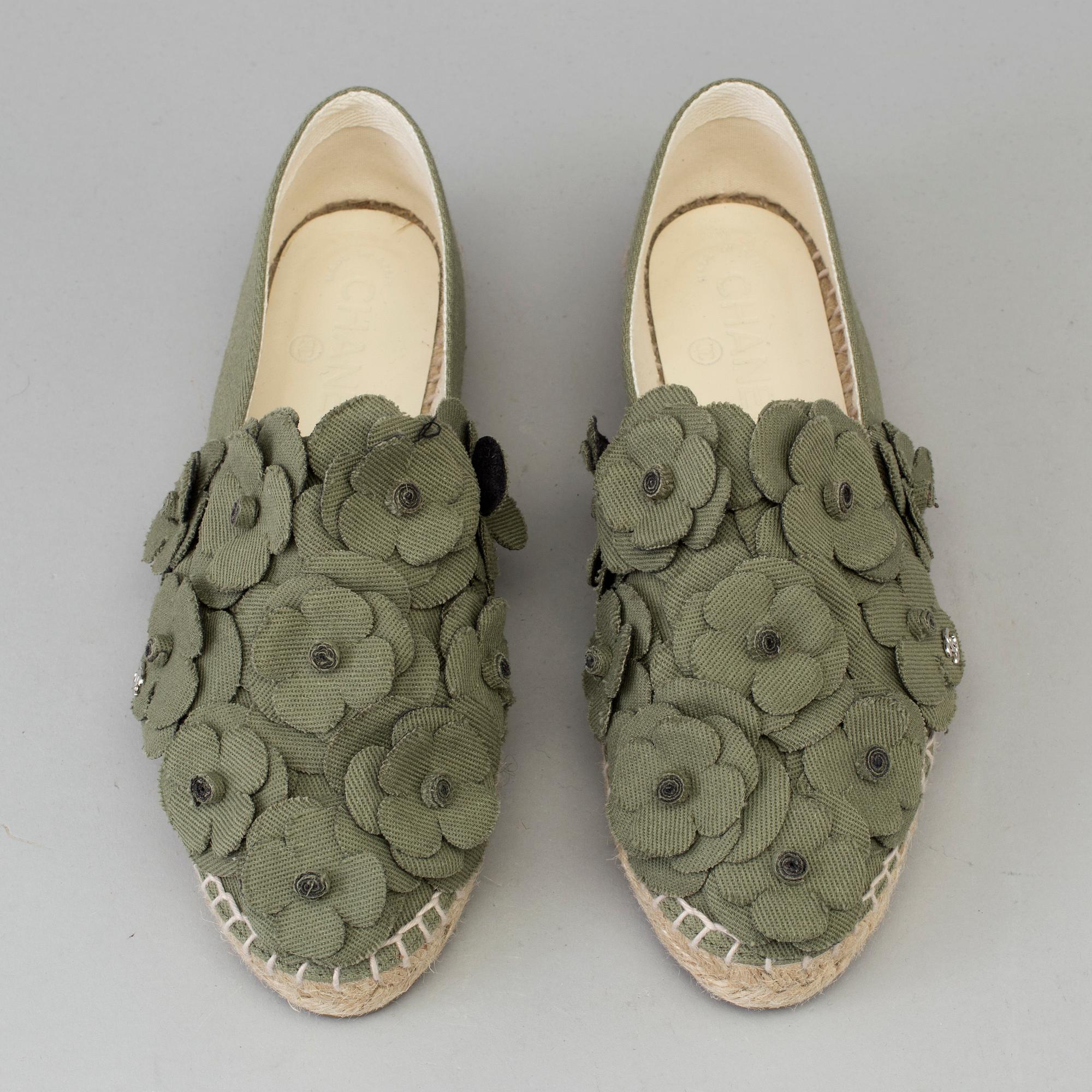 A pair of espadrilles from Chanel.