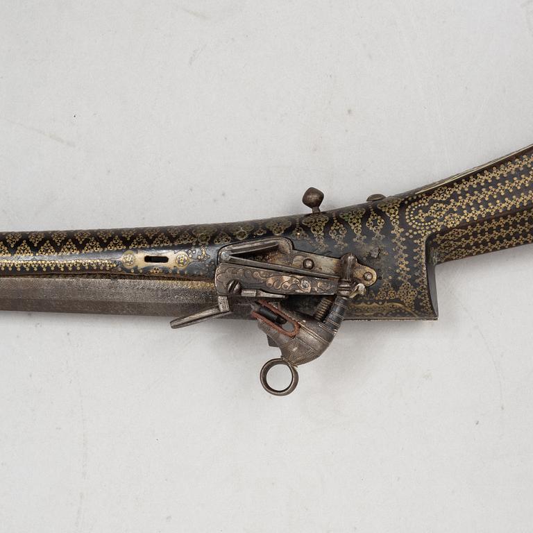 A Persian snaphaunce rifle, 18th century.