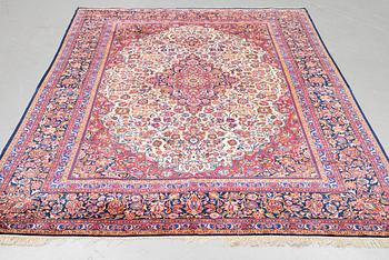 A carpet, semi-antique/old silk Kashan, ca 318,5 x 213,5 cm.