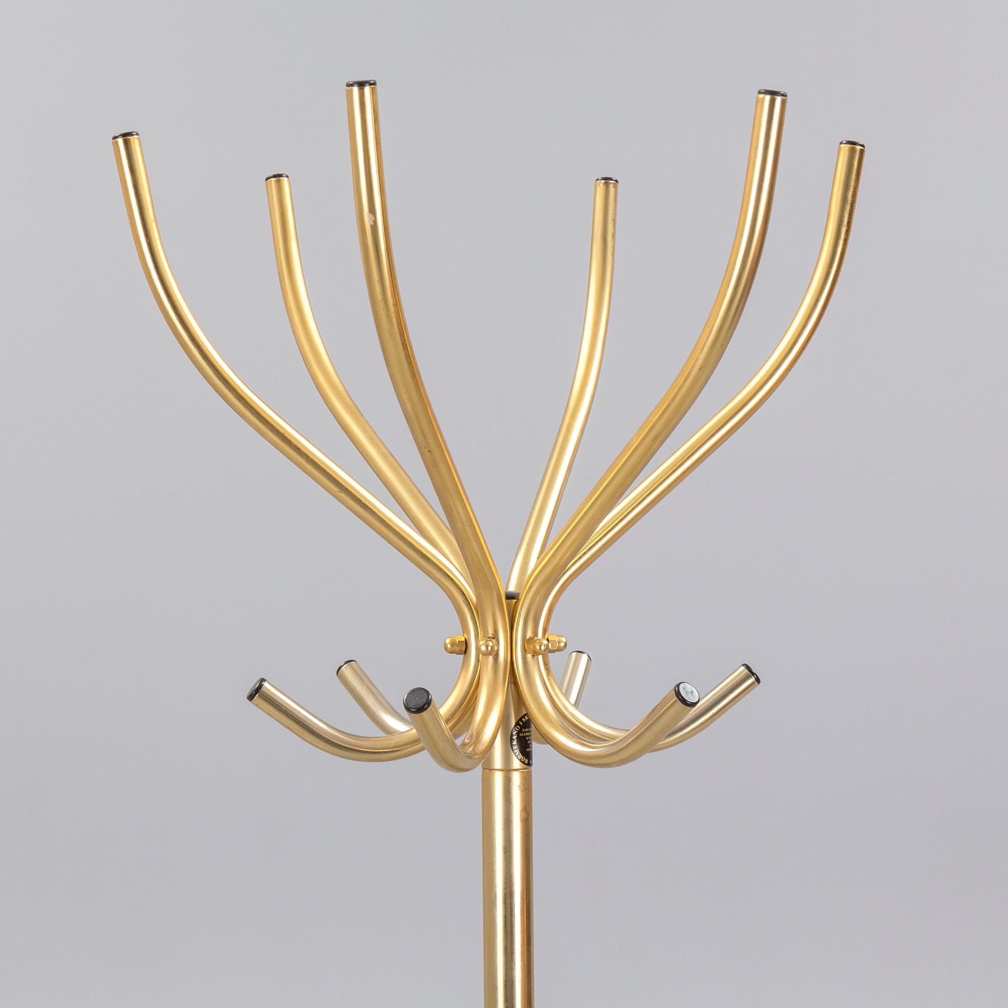 TAMBURMAJOR, guldpläterad metal, Rörmekano. Skånes Fagerhult, Sverige. 1970 / 80-tal.