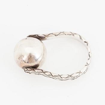 BOTTEGA VENETA, a pair of silver earrings and a silver ring.