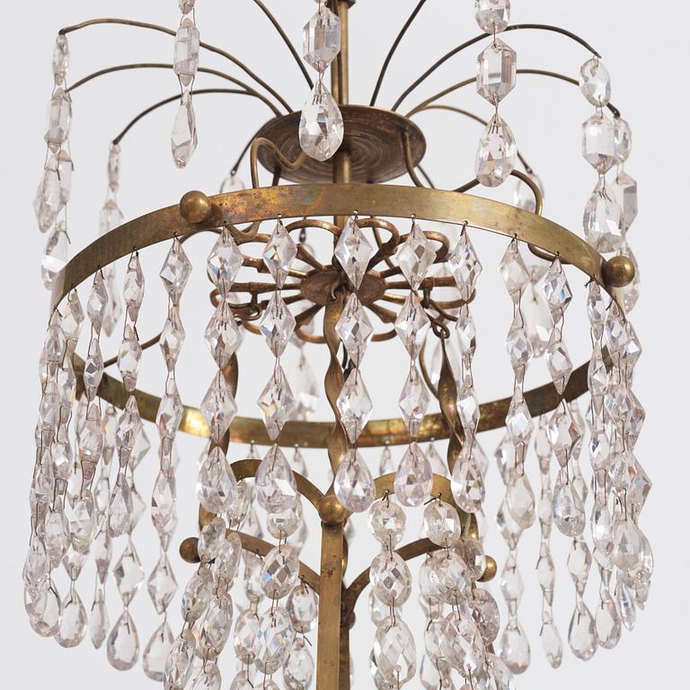 A late Gustavian five-light gilt brass chandelier, late 18th century.