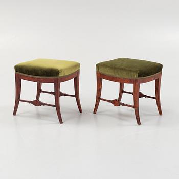 A pair of Swedish Empire stools, early 19th century.