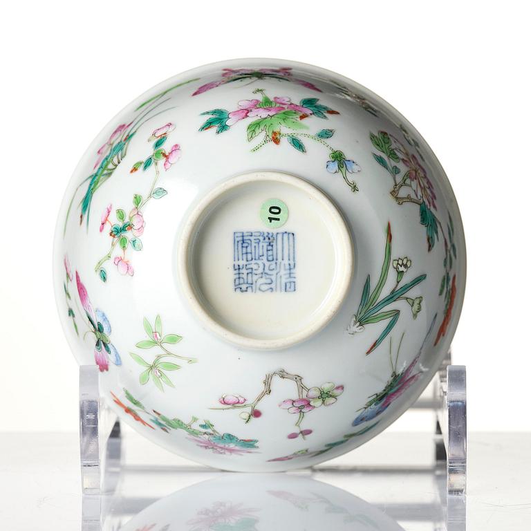 A famille rose 'butterfly' bowl, Qing dynasty with Daoguang mark and of the period (1820-1850).