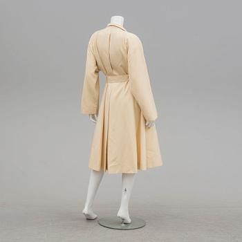 A trench-coat by Guy Laroche.