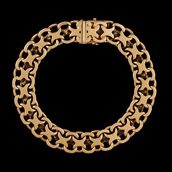 ARMBAND, 18k guld, X-länk, EHW, Stockholm, 1947. Vikt ca 43,3 g.
