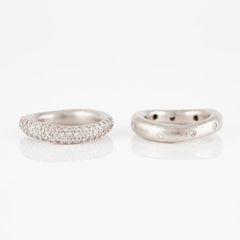 Ole Lynggaard two "Love" rings no. 4 in 18K white gold with round brilliant-cut diamonds.