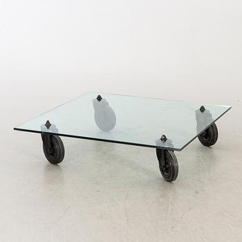 A GAE AULENTI "TAVOLO CON RUOTE" SOFA TABLE, marked Schopenhauer Grupo Fontana Arte, Italy.