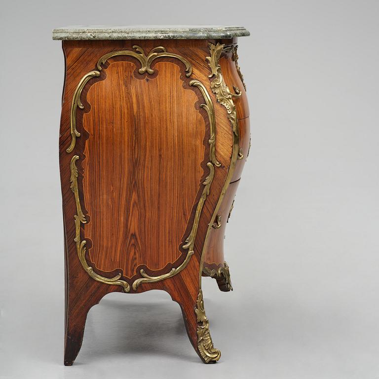 A rococo parquetry and gilt brass-mounted commode by L. Nordin (master in Stockholm 1743-1773).