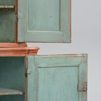A rococo corner cabinet, later part 18th century.