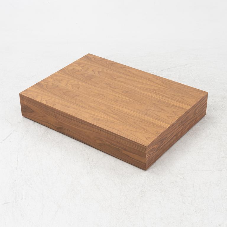 A 'Mass Wide' walnut veneered coffee table from New Works.