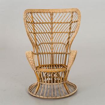 A GIO PONTI ARMCHAIR.