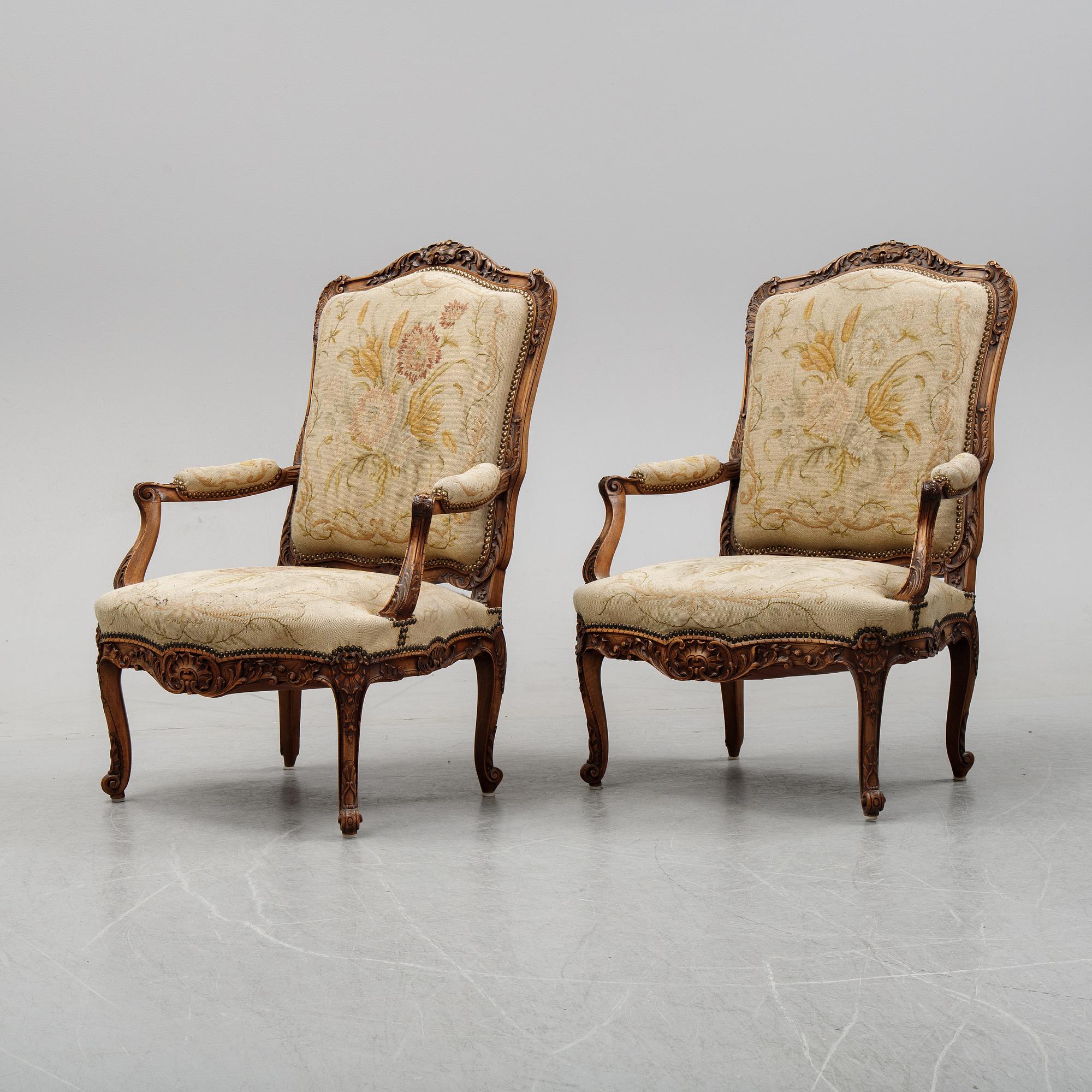 A pair of Louis XV style armchairs from early 20th Century.