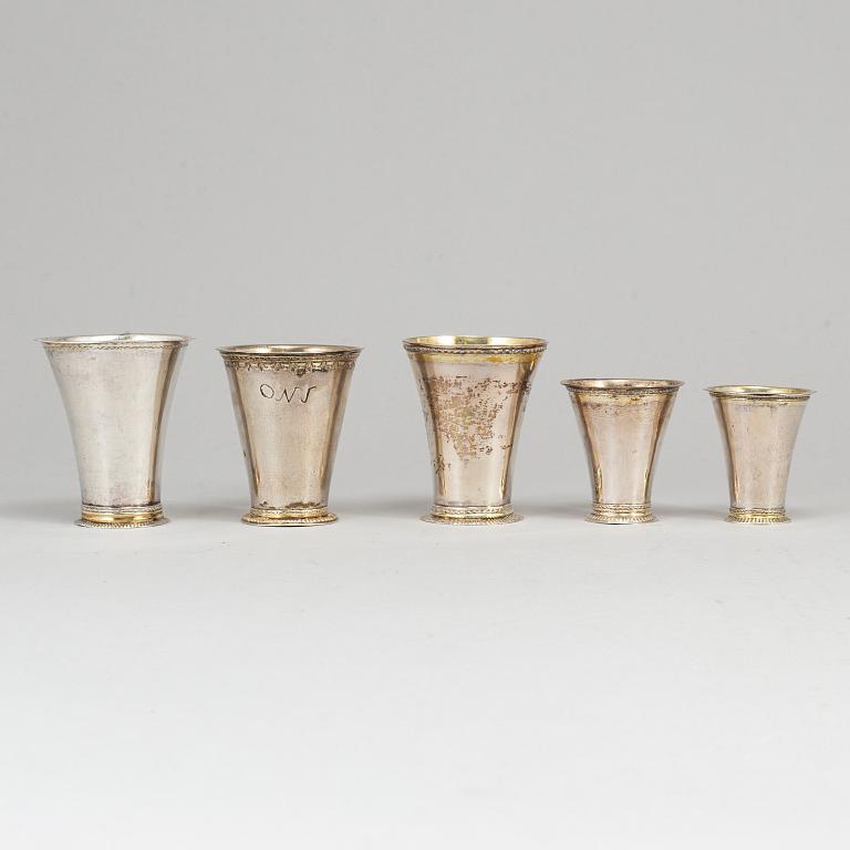 Five Swedish 18th century parcel-gilt silver beakers.