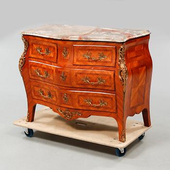 A rococo style chest of drawers, around the mid 20th century.