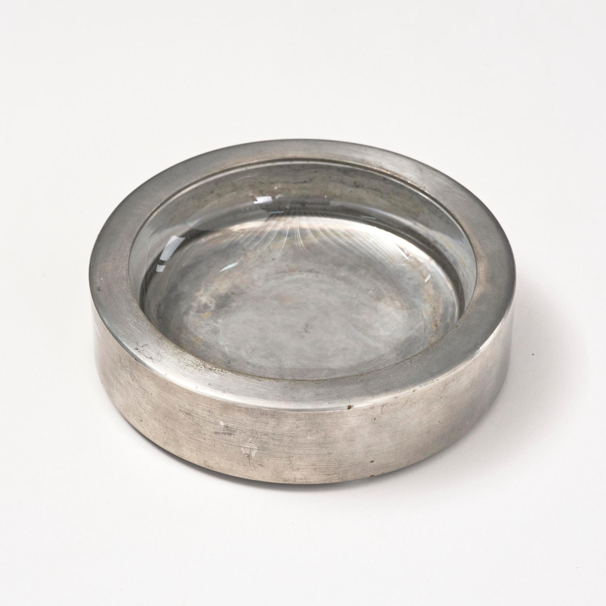 Firma Svenskt Tenn, a pewter and glass ashtray/bowl, Stockholm, 1950.