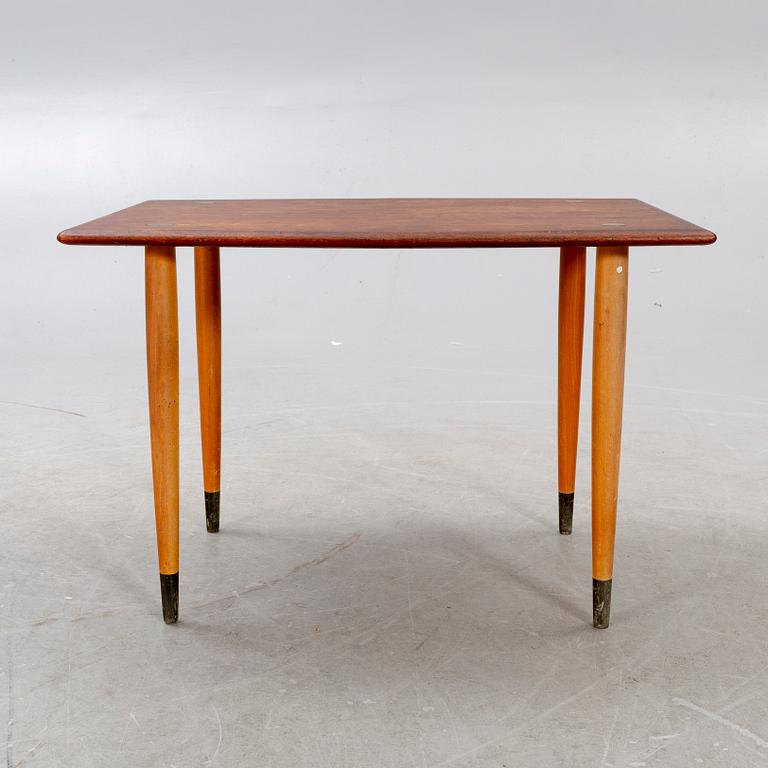 A mid 1900s teak coffee table from Tingströms möbler.