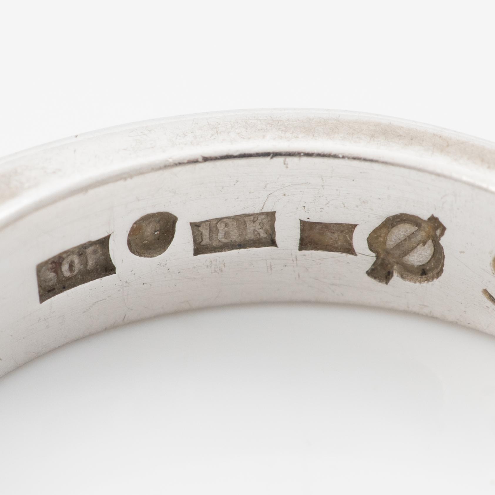 Three rings, 18K white gold with brilliant-cut and princess-cut diamonds.