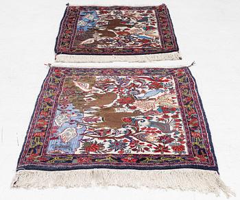 Rugs, a pair, oriental, figural, approximately 96 x 73 cm each.